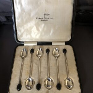 A Set of six cased Silver Coffee Spoons